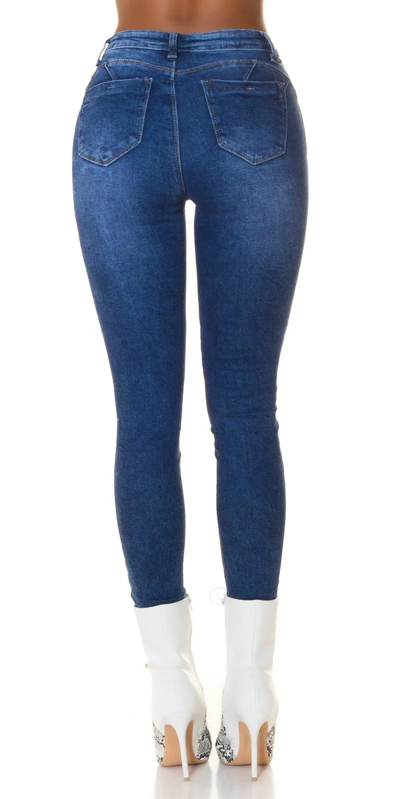 Jeans ajustados gastados de moda 